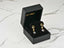 Whispering Butterflies 18K Gold Crystal Drop Earrings with clear crystal drops in a black jewelry box