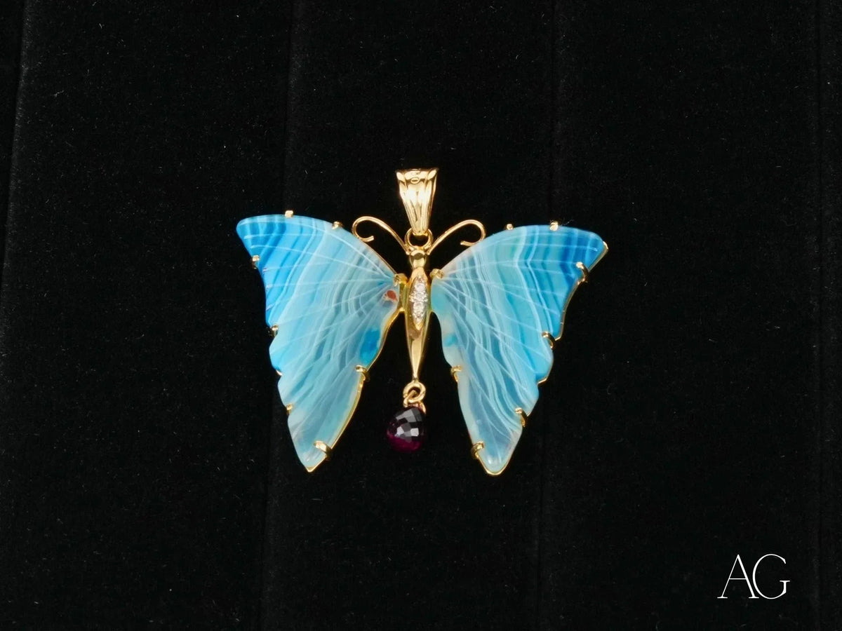 18k solid gold elegance pendant with blue agate wings and ruby