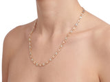 14K tri-colour piastrine chain on a display bust, rose and white plates draping to the upper chest