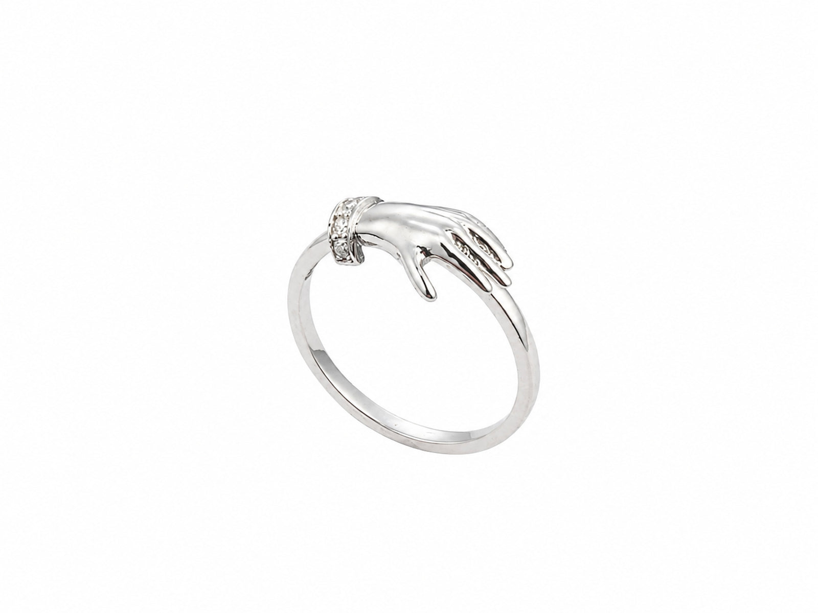 Side view of yellow gold ring with sculpted clasped hands, sapphire and diamond accents